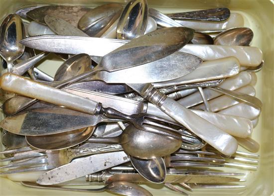 A small group of silver and silver plated cutlery including silver dessert eaters and silver teaspoons.